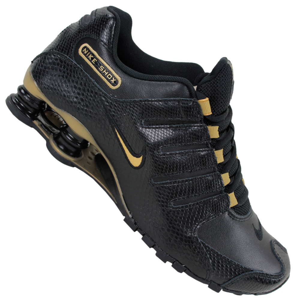 gold and black nike shox