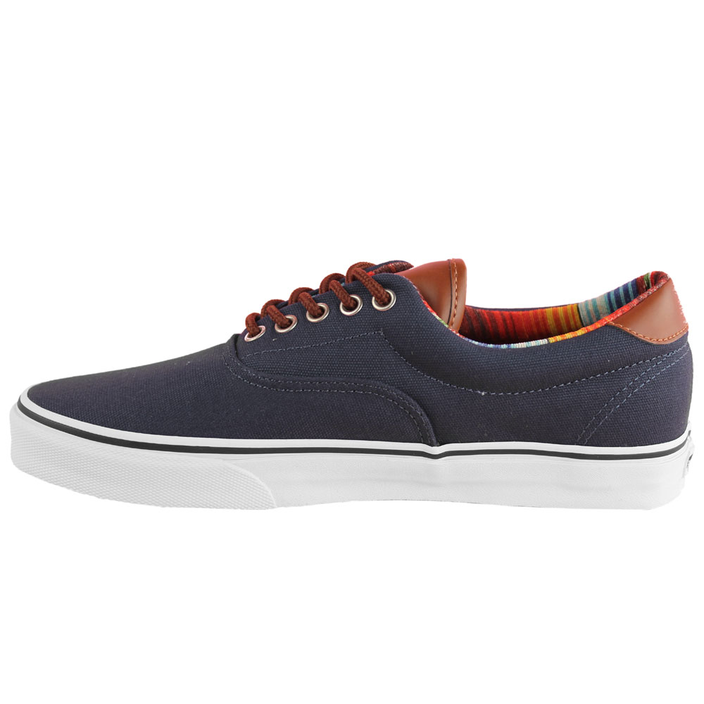 tan vans with blue stripe
